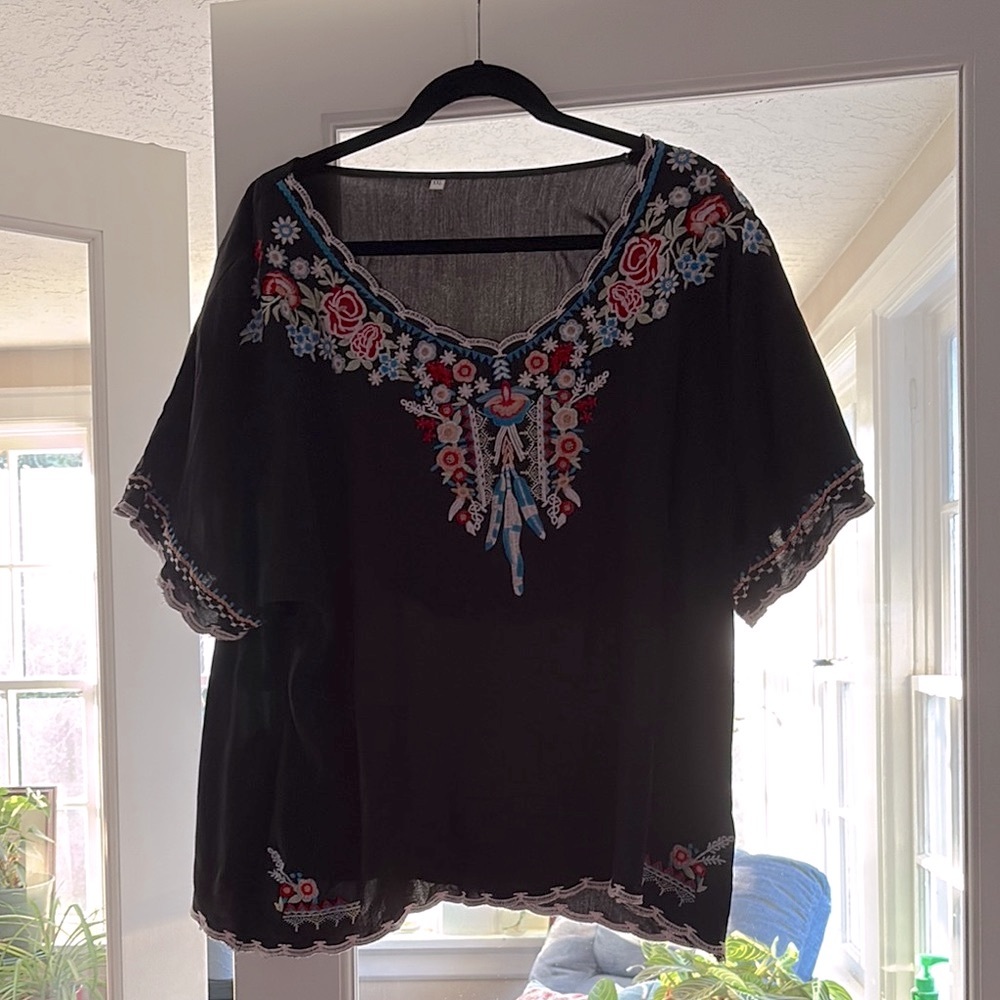 Embellished Black Blouse with Red Accents